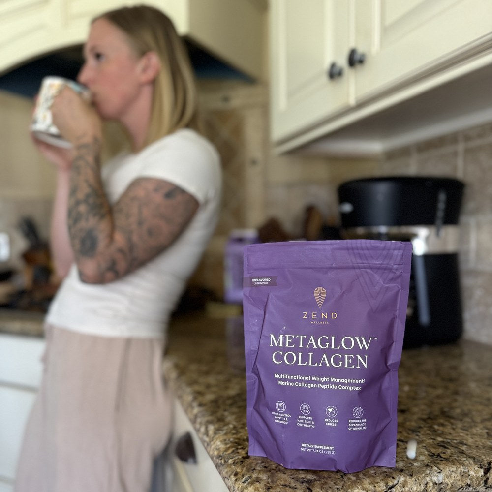 Two people making MetaGlow coffee in a kitchen